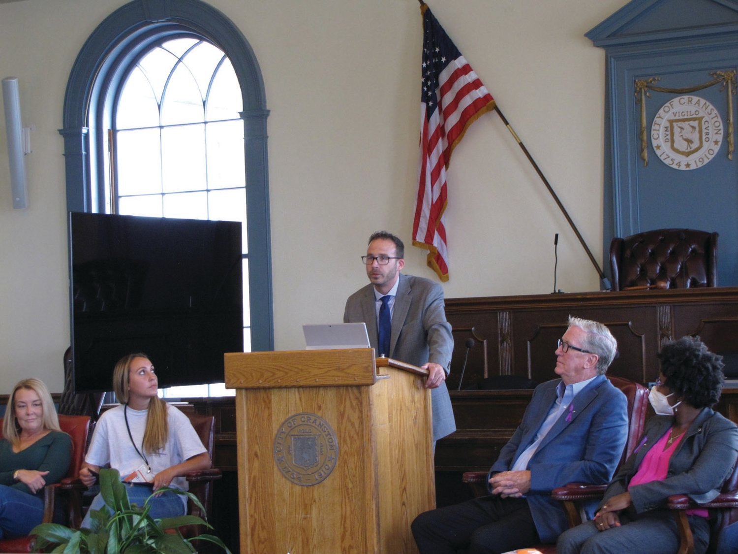 SHARING HIS STORY: Ward 6 Councilman Matthew Reilly speaks about his addiction and recovery during a Recovery Month event last week in City Hall’s Council Chambers. Looking on, from left, are Tara Canavan, Megan Perry, Mayor Ken Hopkins and Ward 2 Councilwoman Aniece Germain.